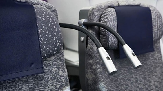 Adjustable personal light and 6-way adjustable headrest